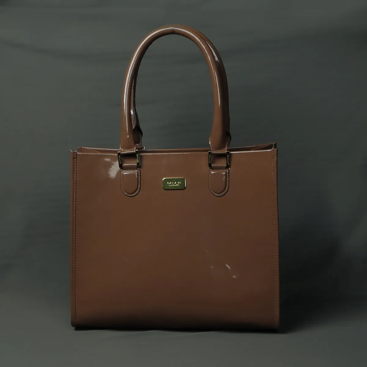 Brown Brush Off Patent Leather Hand Bag
